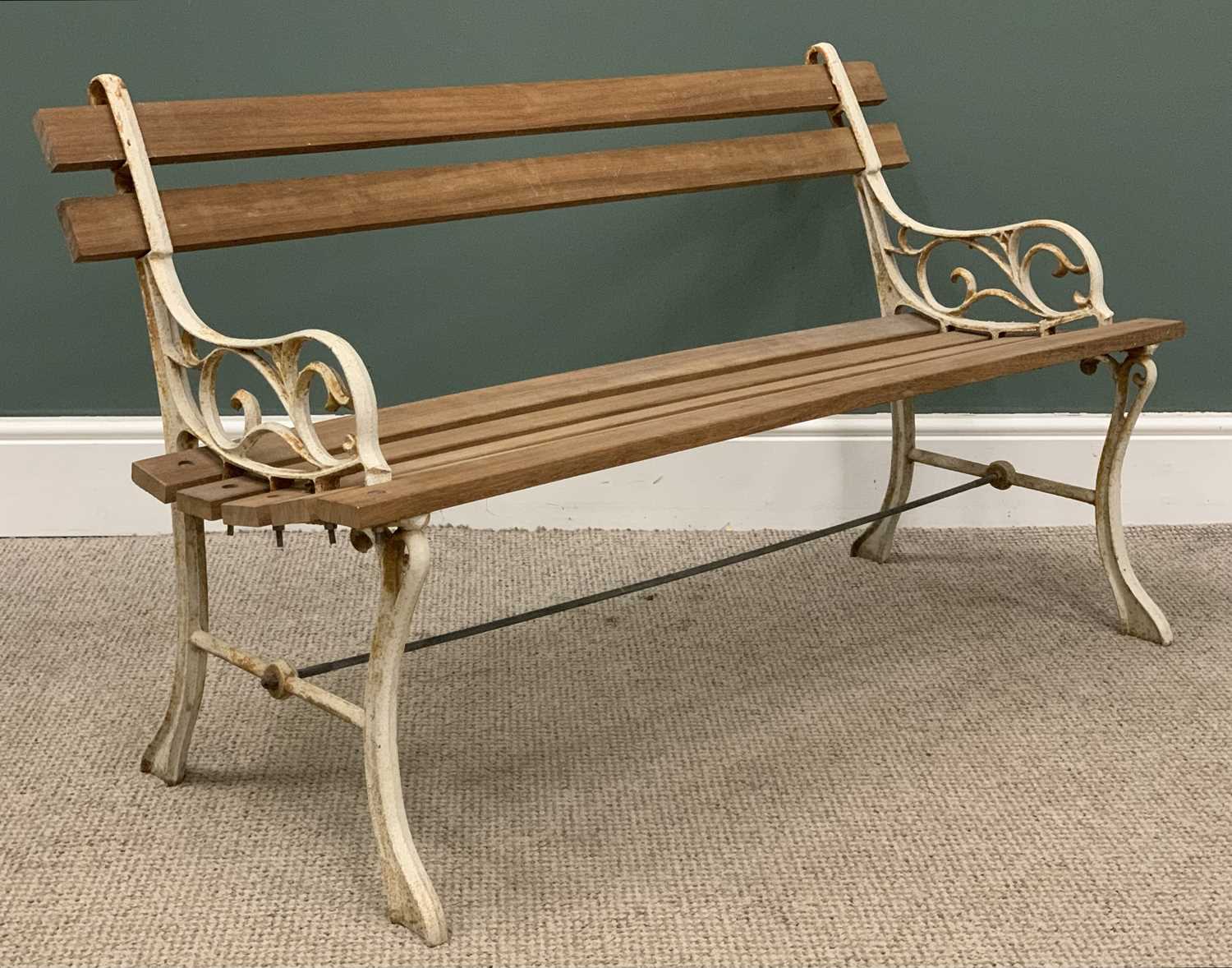 GARDEN BENCH with slatted wooden planks and cast ends, 69 (h) x 122 (w) x 56 (d) cms Provenance: - Image 3 of 3