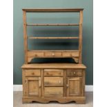 VINTAGE PINE DRESSER with open three shelf rack and spice drawers, the base with carved doors,