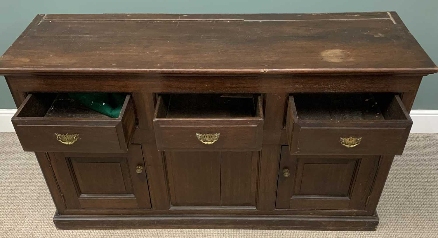 OAK DRESSER BASE circa 1900 and having three drawers over two cupboard doors with fielded panels, 90 - Image 2 of 2