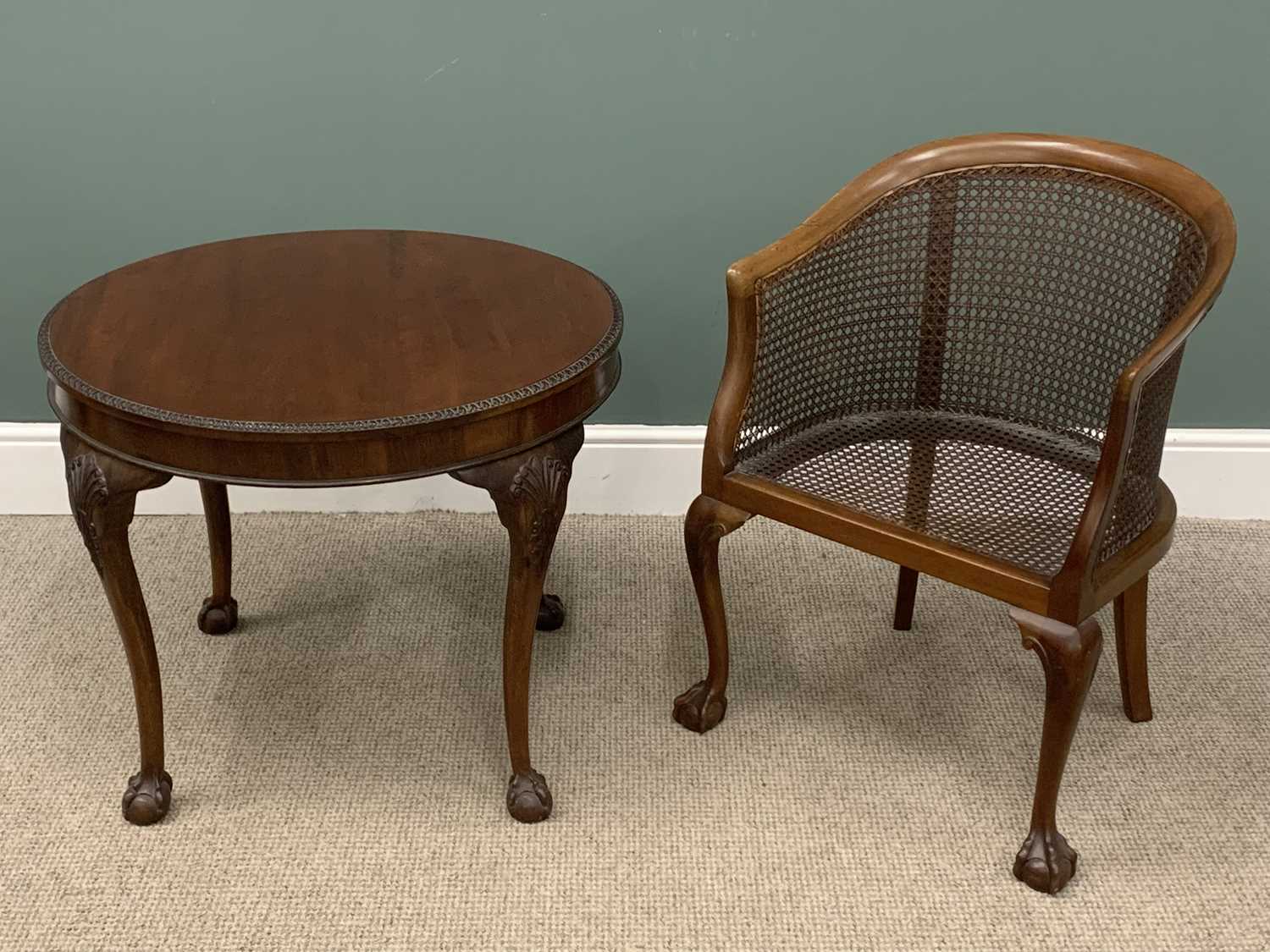 CIRCULAR TOPPED TEA TABLE on carved and ball and claw supports, 62 (h) x 76 (diam) cms and a Bergere