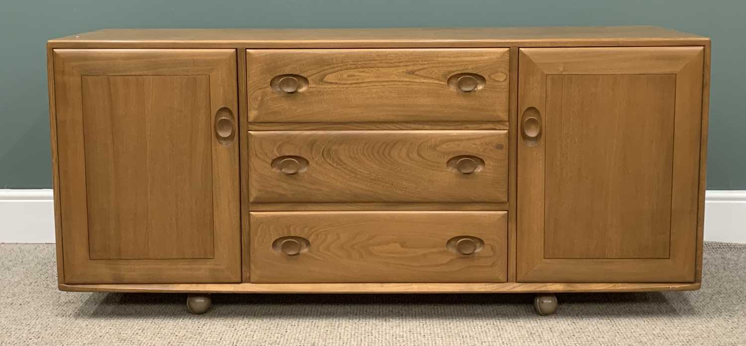 LIGHT ERCOL SIDEBOARD with three central drawers including a cutlery tray, two cupboard doors, on