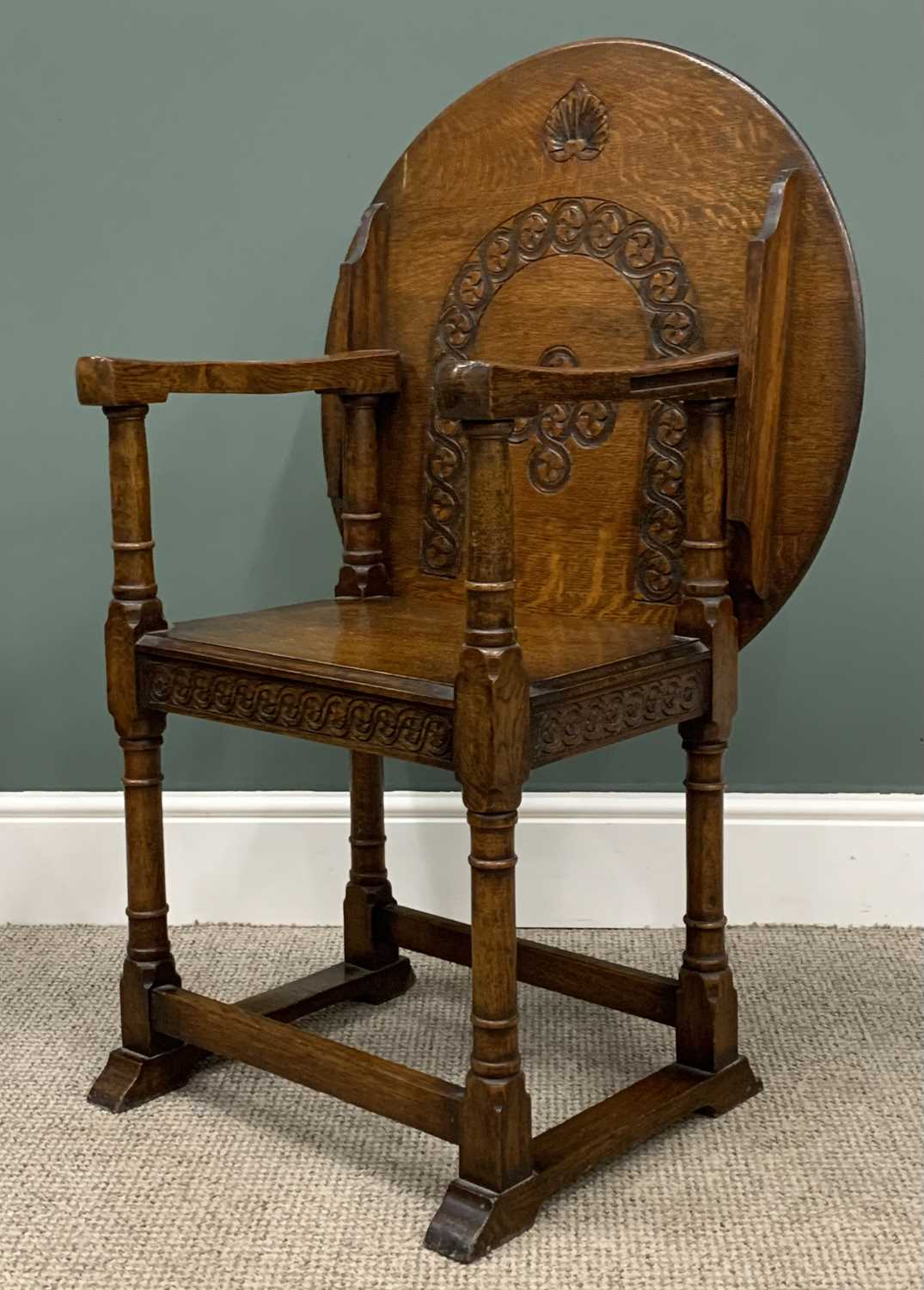 EARLY 20th CENTURY OAK MONK'S BENCH/CHAIR with circular carved top, 74 (h) x 69 (diam) cms - Image 2 of 4