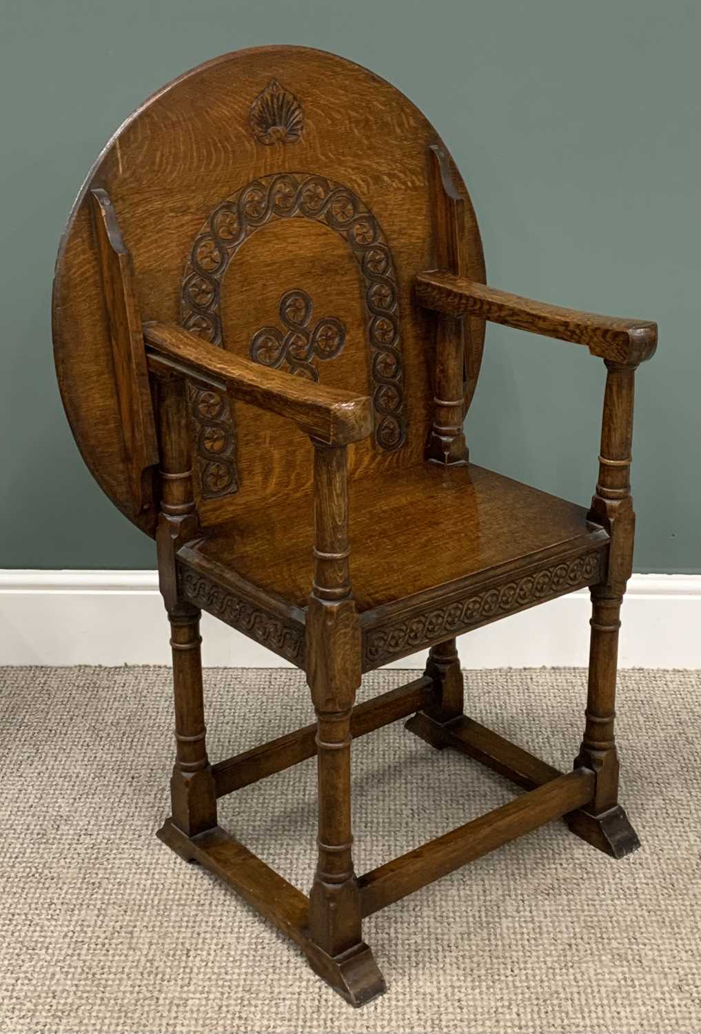 EARLY 20th CENTURY OAK MONK'S BENCH/CHAIR with circular carved top, 74 (h) x 69 (diam) cms - Image 3 of 4