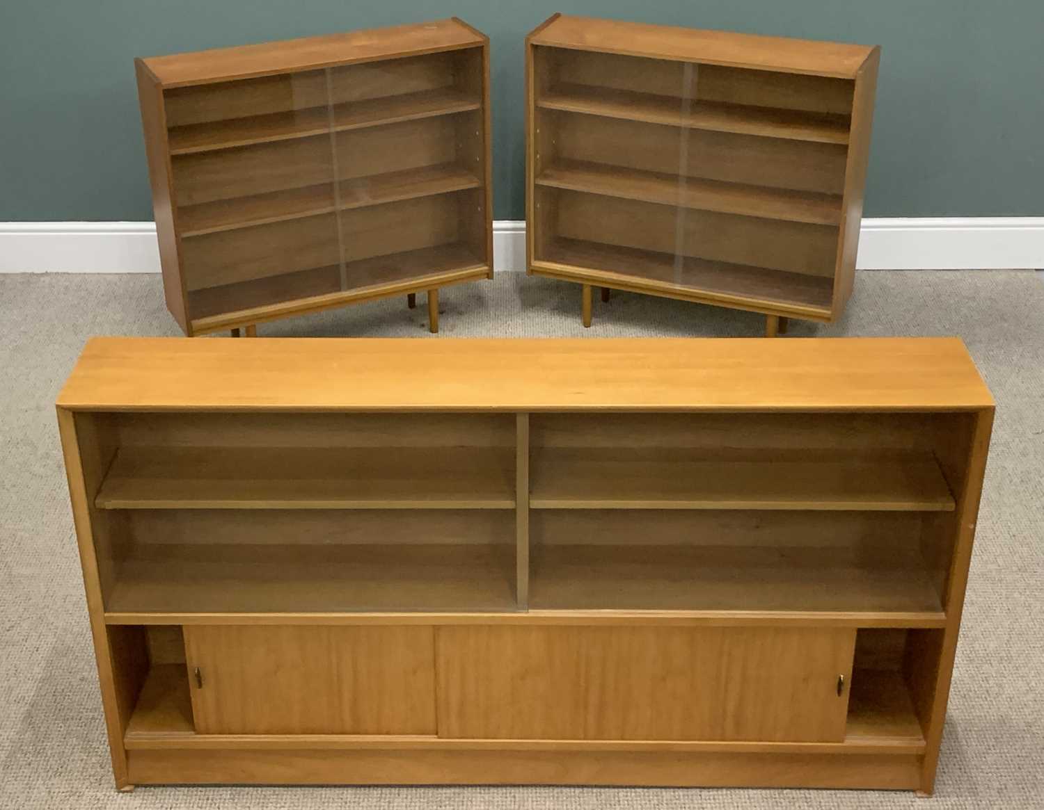 MID-CENTURY TYPE BOOKCASE with glazed sliding doors, 84 (h) x 152 (w) x 24 (d) cms and a SMALLER