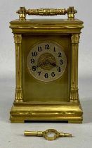 GILT BRASS CASED CARRIAGE CLOCK, late 19th century with fluted columns, circular silvered dial