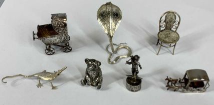 GROUP OF MINIATURE SILVER/WHITE METAL ORNAMENTS, including a pram, 5.5cms (h), rearing cobra,