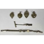 SILVER WHITE METAL GROUP including four fobs and an ornate fob watch chain with floral painted