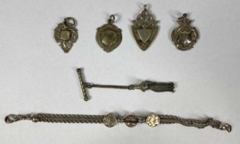 SILVER WHITE METAL GROUP including four fobs and an ornate fob watch chain with floral painted
