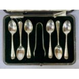 CASED SET OF SIX GEORGE V SILVER TEASPOONS, with matching tongs, Sheffield 1921, Cooper Brothers &