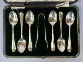 CASED SET OF SIX GEORGE V SILVER TEASPOONS, with matching tongs, Sheffield 1921, Cooper Brothers &