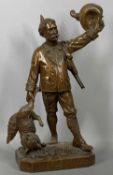 WELL CARVED LATE 19TH CENTURY BLACK FOREST FIGURE OF A HUNTSMAN wearing traditional costume, holding