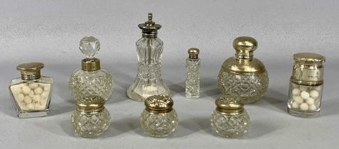 GROUP OF NINE SILVER MOUNTED GLASS DRESSING TABLE JARS & SCENT BOTTLES, 12cms (h) the tallest
