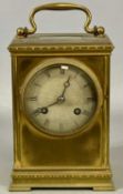 FRENCH GILT BRASS CASED CARRIAGE CLOCK, late 19th century, circular silvered dial with black Roman