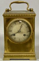 FRENCH GILT BRASS CASED CARRIAGE CLOCK, late 19th century, circular silvered dial with black Roman