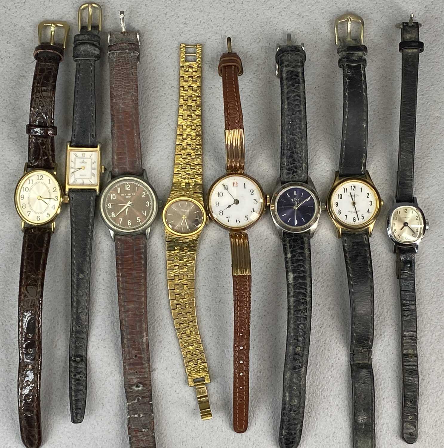 COLLECTION OF LADY'S WRISTWATCHES including gold example, circular white enamel dial with Arabic