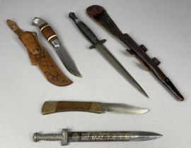 FAIRBAIRN SYKES TYPE COMMANDO KNIFE, 29.5cms (overall l) with leather sheath, Brusletts sheath