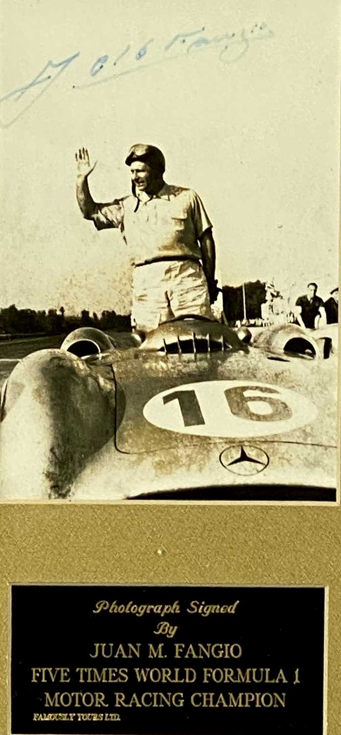 BLACK AND WHITE PHOTOGRAPH - JUAN M. FANGIO in Mercedes Benz racing car, signed in pen, 14 x 9.