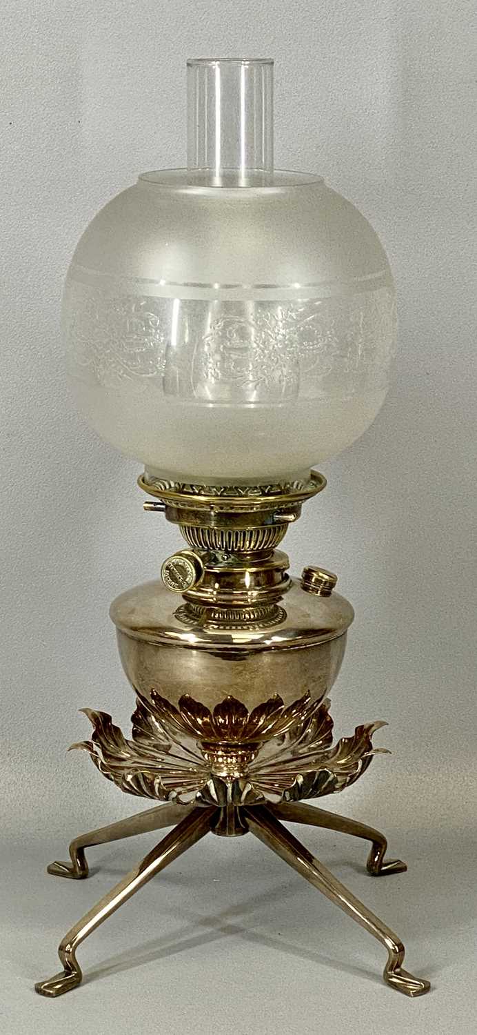 SILVER PLATED OIL LAMP by W. A. S. Benson, twin burners, circular reservoir, leaf design under