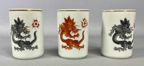 THREE MEISSEN 'LUCKY DRAGON' BRUSH POTS, gilded bands to rim, blue cross swords mark numbered