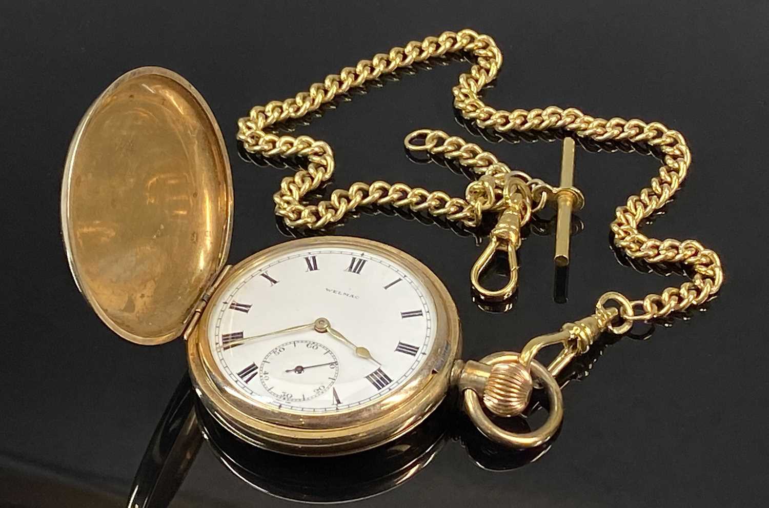 WELMAC GOLD PLATED FULL HUNTER POCKET WATCH, top wind, white enamel dial with black Roman numerals