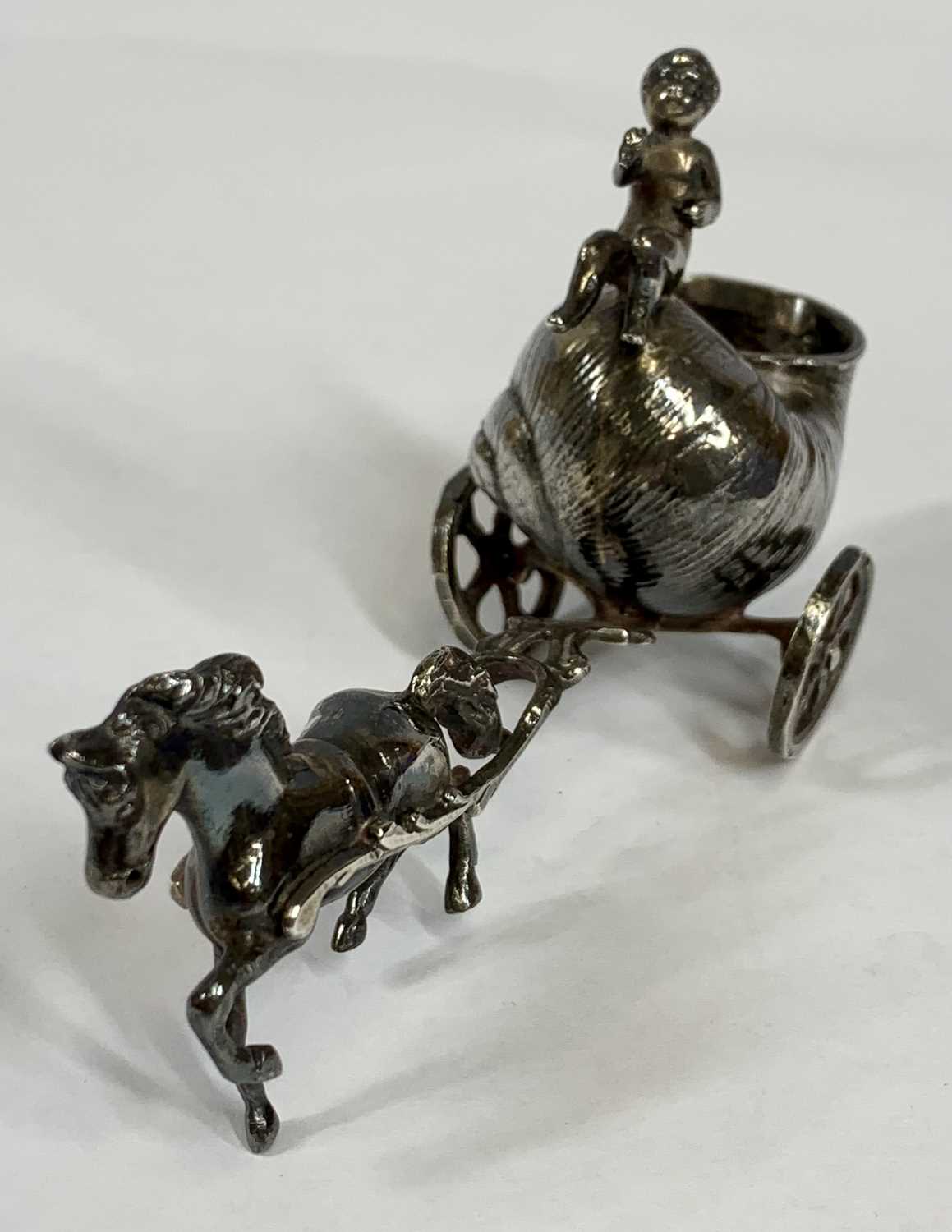 NOVELTY CONTINENTAL CAST SILVER SALT, modelled as cherub riding a snail shell chariot pulled by - Image 2 of 3