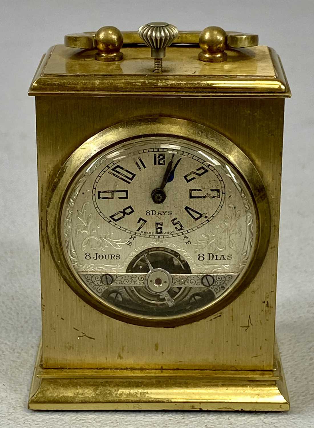 MINIATURE FRENCH GILDED BRASS CARRIAGE CLOCK, early 20th century, three quarter silvered dial with