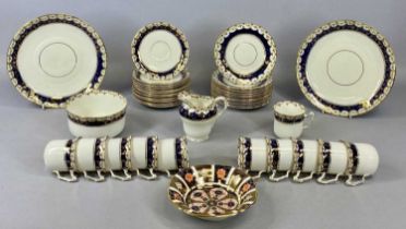 A DUCHESS CHINA TEA SERVICE, cream glazed with floral blue and gilt banded border, 38 pieces, with a