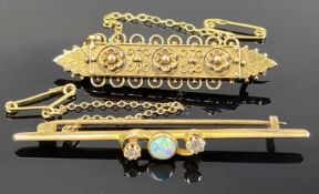 TWO YELLOW METAL BAR BROOCHES, one set with a central opal flanked by four small diamonds, with