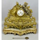 GILDED SPELTER MANTEL CLOCK, late 19th century, barrel dial surmounted with a figure of a female