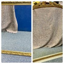 VICTORIAN GILT FRAMED ARCHED OVER MANTEL MIRROR, scrolled surmount, 124 (h) x 110cms (w) with a