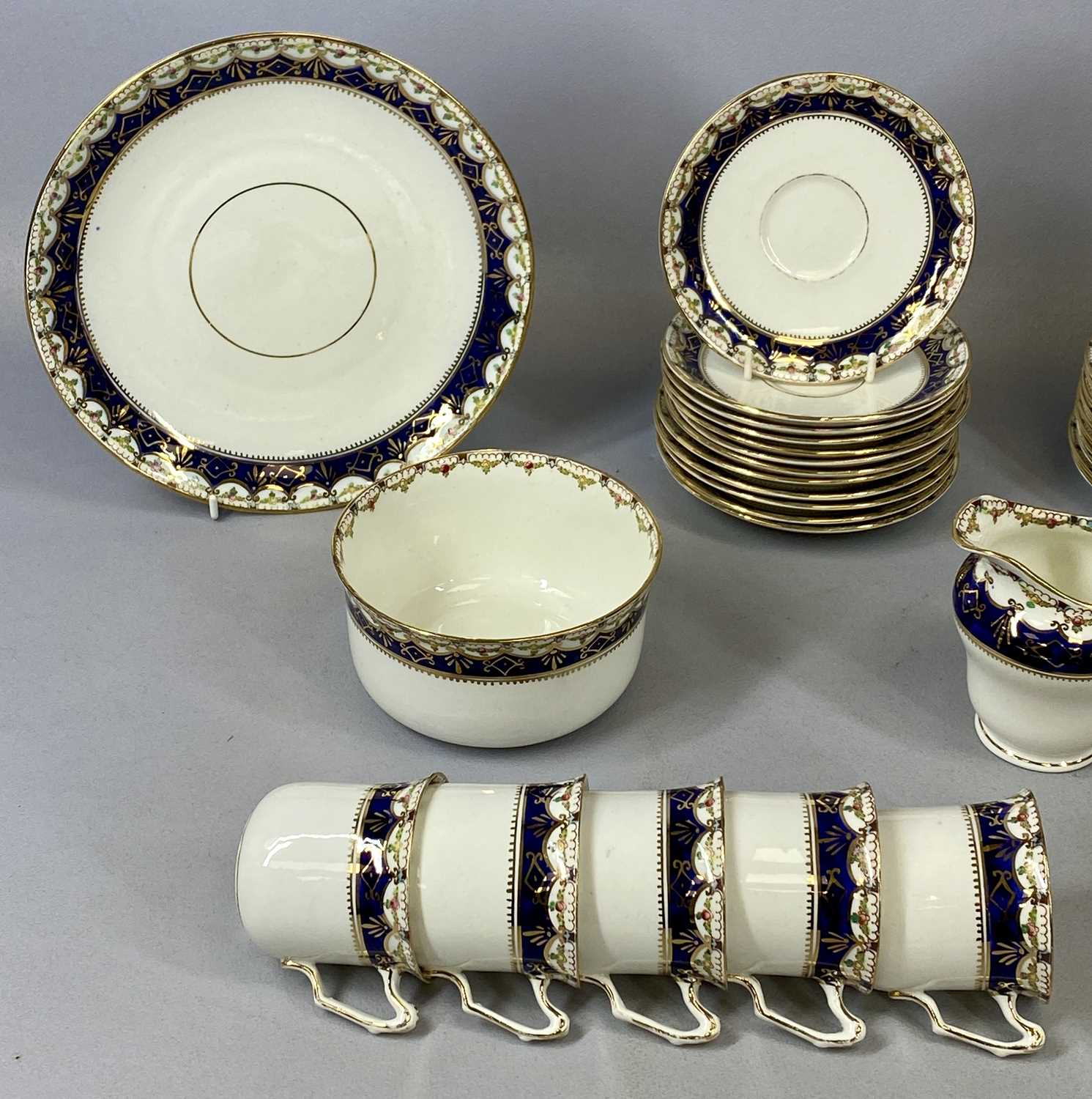 A DUCHESS CHINA TEA SERVICE, cream glazed with floral blue and gilt banded border, 38 pieces, with a - Image 2 of 5