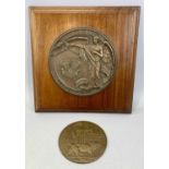 WORLD WAR I CIRCULAR BRONZE DEATH PLAQUE to Owen Roberts, 12cms (diam.) with a circular bronze