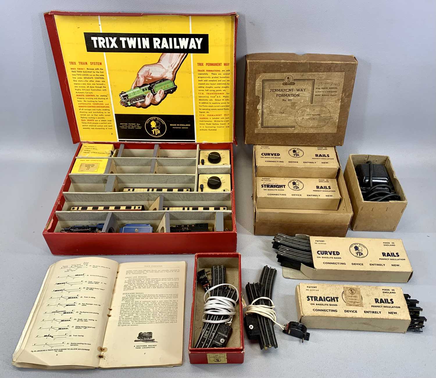 TRIX TWIN RAILWAY VINTAGE ELECTRIC TRAIN SET, all boxed, including two locomotives, carriages,