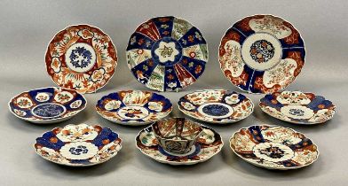 GROUP OF TEN JAPANESE IMARI CIRCULAR SCALLOPED DISHES, traditional decoration, 25cms (diam.) the