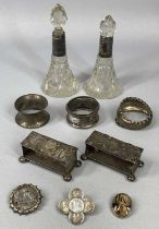 MIXED SILVER LOT including silver stands a pair, embossed strap tops and on bun feet, London 1910,