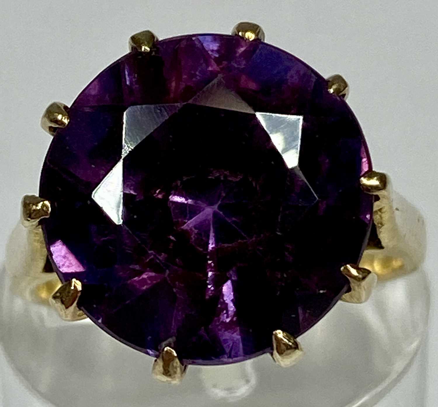 UNMARKED GOLD RING SET WITH LARGE CIRCULAR AMETHYST, size I, 4.4gms Provenance:on behalf of St