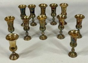 COLLECTION OF TWELVE SILVER KIDDUSH CUPS, various makers and assays, each with engraved
