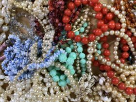 COLLECTION OF COSTUME JEWELLERY including simulated pearl necklaces, shell necklaces, brooches and