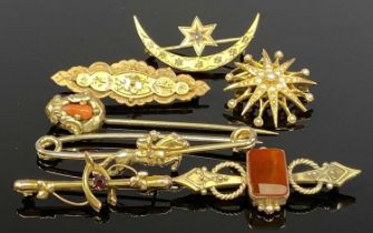 GROUP OF SEVEN GOLD/GOLD TONE BROOCHES, set with cornelian, coral, seed pearl and others Provenance: