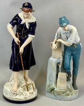 TWO LARGE ROYAL DUX FIGURES, young lady in blue dress and hat digging with fork, 53cms (h), boy in