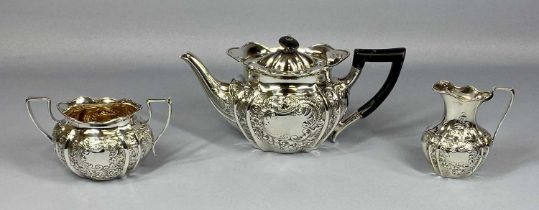 VICTORIAN/EDWARDIAN SILVER THREE PIECE TEA SERVICE, oval form, scroll and floral embossed