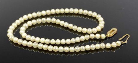 CULTURED PEARL SINGLE STRAND NECKLACE with 9ct gold clasp, 36cms (l) Provenance: private