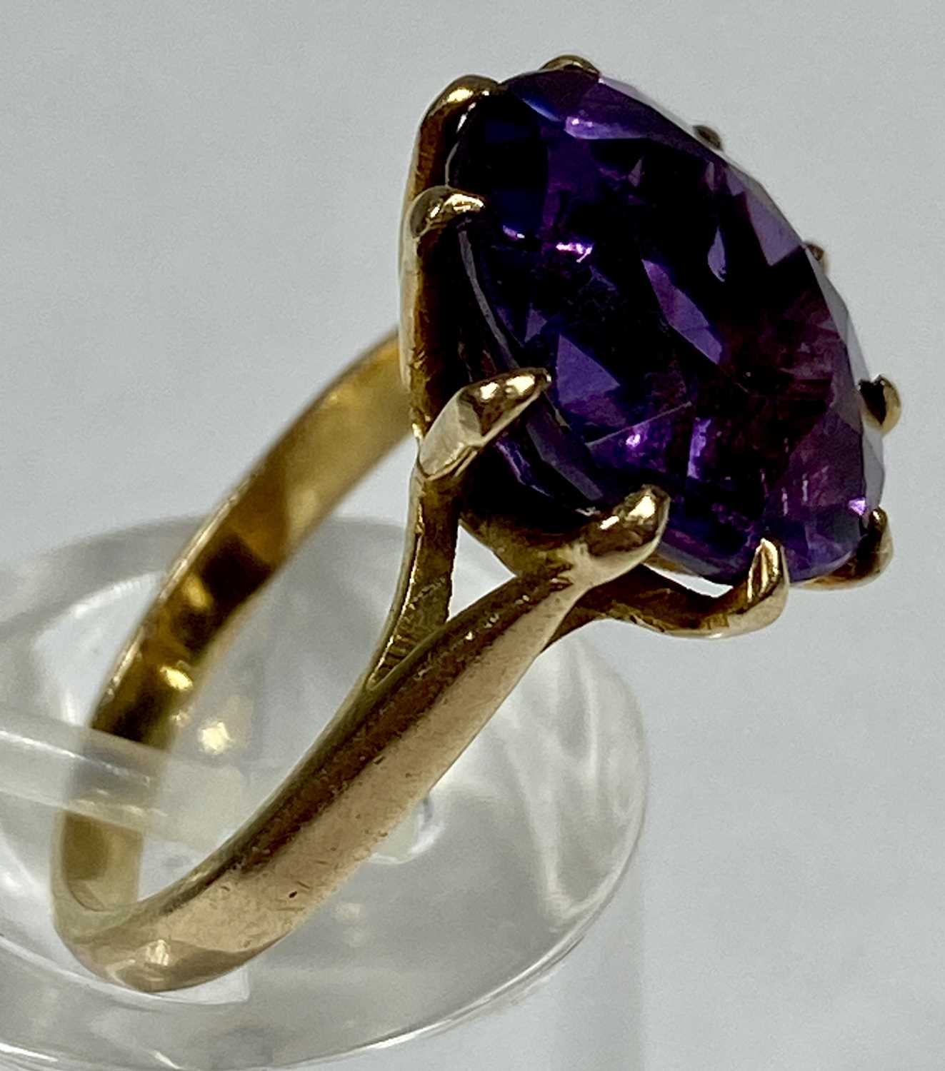 UNMARKED GOLD RING SET WITH LARGE CIRCULAR AMETHYST, size I, 4.4gms Provenance:on behalf of St - Image 3 of 4