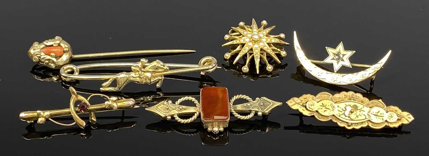 GROUP OF SEVEN GOLD/GOLD TONE BROOCHES, set with cornelian, coral, seed pearl and others Provenance: - Image 2 of 2