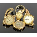 FOUR 9CT GOLD LADY'S WRISTWATCHES, two circular, one oval and one octagonal, three with plated