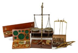 COLLECTION OF ANTIQUE BRASS INSTRUMENTS including, two sets of scales, box of apothecary weights,