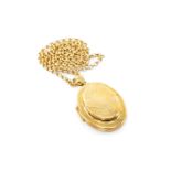 YELLOW METAL OVAL DOUBLE LOCKET PENDANT on 9ct gold circle link chain, 20.4gms, in box Provenance: