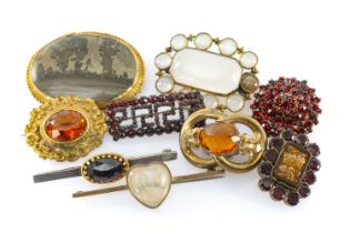 ASSORTED VINTAGE BROOCHES including garnets, amethysts, opal, moonstone ETC Provenance: private