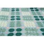 TRADITIONAL WELSH WOOLEN BLANKET of geometric design, pale blue ground with white, pink and green