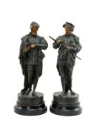 PAIR OF DECORATIVE SPELTER FIGURES, titled 'Michel-Ange' and 'Bento Cellini' on turned ebonised